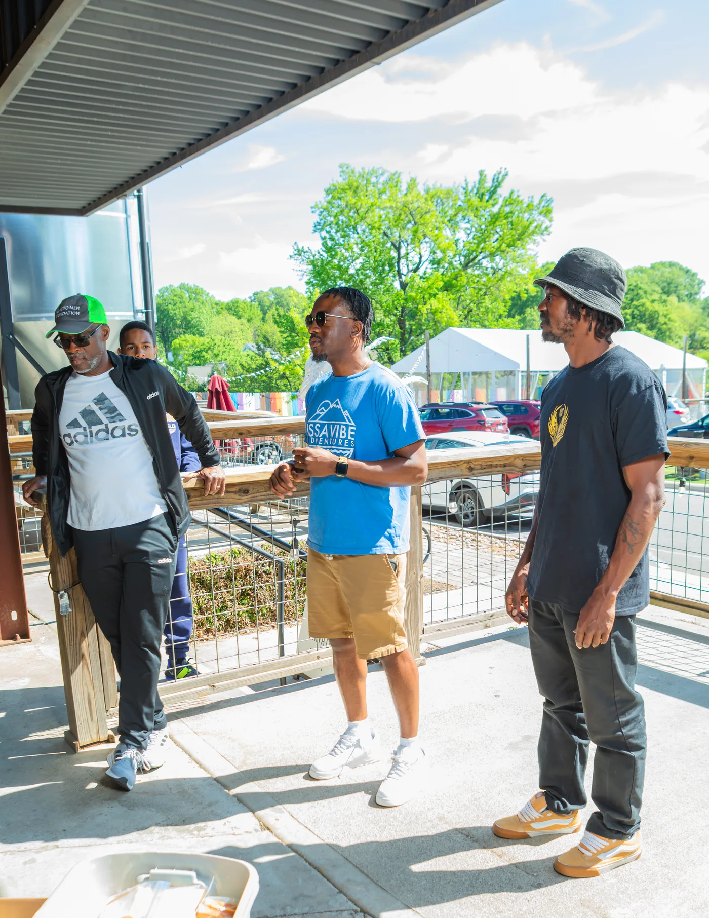 Manna House leaders in conversation outdoors